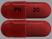 Piroxicam: This is a Capsule imprinted with PR on the front, 20 on the back.