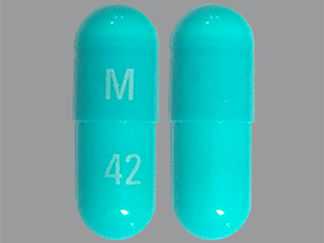 This is a Capsule imprinted with M on the front, 42 on the back.