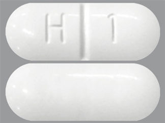 This is a Tablet imprinted with H 1 on the front, nothing on the back.