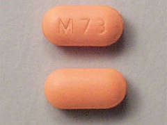 This is a orange oblong Tablet imprinted with M73 on the front, nothing on the back, and is manufactured by MONARCH PHRM.