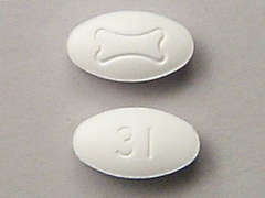 This is a white oval Tablet imprinted with Logo on the front, 31 on the back, and is manufactured by ORGANON LLC.