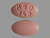 Zocor: Esto es un Tableta ladrillo rojo oval imprimido con MSD  749 en la parte delantera, nada en la parte posterior, y es fabricado por ORGANON LLC.
