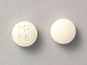 Quinidine Gluconate: This is a Tablet Er imprinted with MP  66 on the front, nothing on the back.