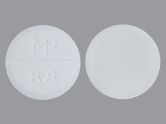 This is a Tablet imprinted with MP  88 on the front, nothing on the back.