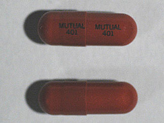 This is a Capsule imprinted with MUTUAL  401 on the front, MUTUAL  401 on the back.