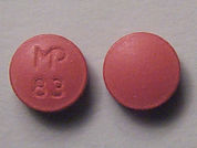 Nystatin: This is a Tablet imprinted with MP  83 on the front, nothing on the back.