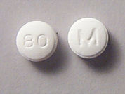 Indapamide: Esto es un Tableta imprimido con M en la parte delantera, 80 en la parte posterior.