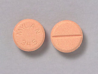 Esto es un Tableta imprimido con MYLAN 345 en la parte delantera, nada en la parte posterior, y es fabricado por None.