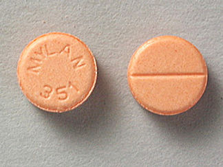 This is a Tablet imprinted with MYLAN  351 on the front, nothing on the back.
