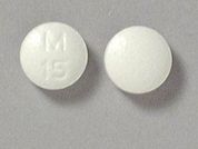 Diphenoxylate W/Atropine: Esto es un Tableta imprimido con M  15 en la parte delantera, nada en la parte posterior, y es fabricado por None.