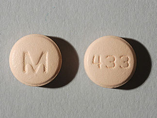 This is a Tablet imprinted with M on the front, 433 on the back.