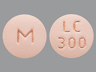 This is a Tablet Er imprinted with M on the front, LC  300 on the back.