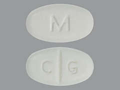 This is a white oval Tablet imprinted with M on the front, C G on the back, and is manufactured by MYLAN.