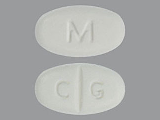 This is a Tablet imprinted with M on the front, C G on the back.