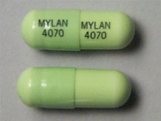 Esto es un Cápsula imprimido con MYLAN  4070 en la parte delantera, MYLAN  4070 en la parte posterior, y es fabricado por None.