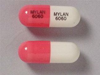 Esto es un Cápsula Er 12 Hr imprimido con MYLAN  6060 en la parte delantera, MYLAN  6060 en la parte posterior, y es fabricado por None.