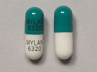 Esto es un Cápsula LP Pellets 24 Hr imprimido con MYLAN  6320 en la parte delantera, MYLAN  6320 en la parte posterior, y es fabricado por None.