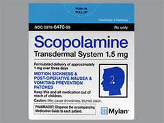 This is a peach round Patch Transdermal 3 Day imprinted with Scopolamine 1 mg / 3 days on the front, nothing on the back, and is manufactured by MYLAN.