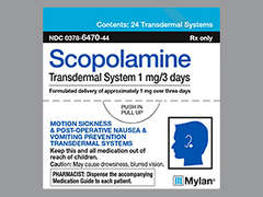 This is a peach round Patch Transdermal 3 Day imprinted with Scopolamine 1 mg / 3 days on the front, nothing on the back, and is manufactured by MYLAN.