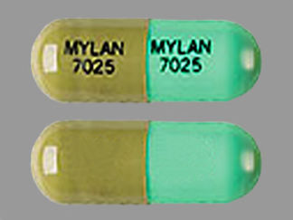 This is a Capsule imprinted with MYLAN  7025 on the front, MYLAN  7025 on the back.