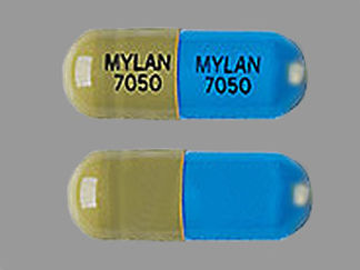 This is a Capsule imprinted with MYLAN  7050 on the front, MYLAN  7050 on the back.