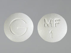 This is a Tablet imprinted with MF 1 on the front, G on the back.
