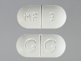 This is a Tablet imprinted with MF  3 on the front, G G on the back.