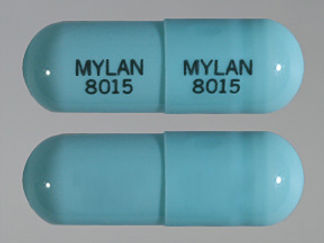 Esto es un Cápsula Dr imprimido con MYLAN  8015 en la parte delantera, MYLAN  8015 en la parte posterior, y es fabricado por None.