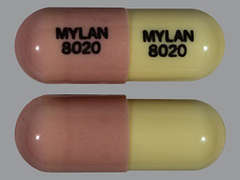 This is a pink oblong Capsule imprinted with MYLAN  8020 on the front, MYLAN  8020 on the back, and is manufactured by MYLAN.