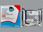Wixela Inhub: Esto es un Blíster Con Dispositivo Para Inhalación blanco imprimido con nada en la parte delantera, nada en la parte posterior, y es fabricado por MYLAN.