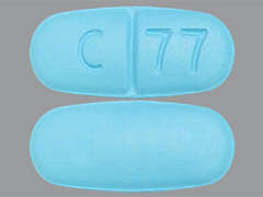 Esto es un Tableta LP azul claro oblongo imprimido con C 77 en la parte delantera, nada en la parte posterior, y es fabricado por NIVAGEN PHARMAC.