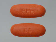 This is a dark red oblong Tablet imprinted with CG on the front, HHH on the back, and is manufactured by NOVARTIS.