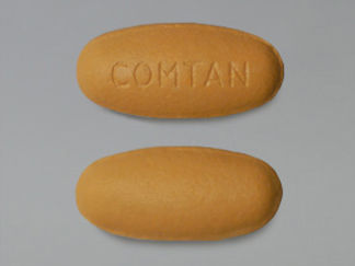 This is a Tablet imprinted with COMTAN on the front, nothing on the back.