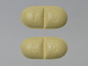 Trileptal: This is a Tablet imprinted with T D on the front, C G on the back.