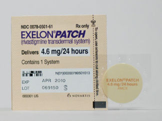 Esto es un Parche Transdérmico 24 Horas imprimido con EXELON PATCH  4.6mg/24 hours  AMCX en la parte delantera, nada en la parte posterior, y es fabricado por None.