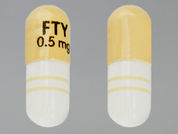 Gilenya: Esto es un Cápsula imprimido con FTY  0.5 mg en la parte delantera, nada en la parte posterior, y es fabricado por None.
