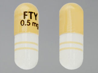 This is a Capsule imprinted with FTY  0.5 mg on the front, nothing on the back.