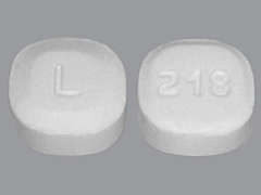 This is a white elliptical Tablet Chewable Dispersible imprinted with L on the front, 218 on the back, and is manufactured by ALEMBIC PHARMAC.