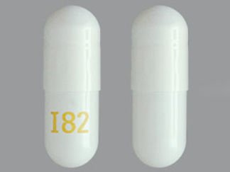 This is a Capsule Dr imprinted with I82 on the front, nothing on the back.