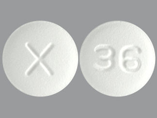 This is a Tablet imprinted with X on the front, 36 on the back.