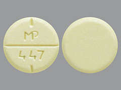 This is a yellow round Tablet imprinted with MP  447 on the front, nothing on the back, and is manufactured by SUN PHARMACEUTI.