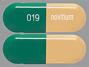 Prazosin Hcl: This is a Capsule imprinted with 019 on the front, novitium on the back.