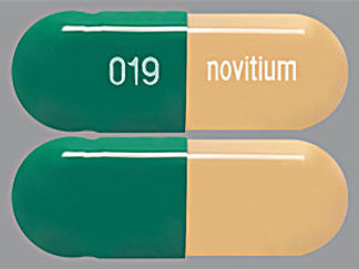 This is a Capsule imprinted with 019 on the front, novitium on the back.