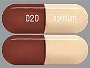 Prazosin Hcl: This is a light brown oblong Capsule imprinted with 020 on the front, novitium on the back, and is manufactured by NOVITIUM/ANI PH.