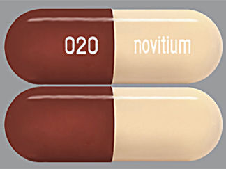 This is a Capsule imprinted with 020 on the front, novitium on the back.