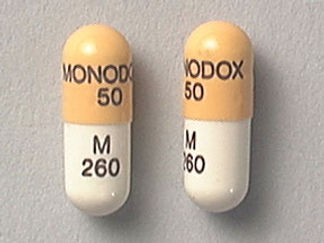 This is a Capsule imprinted with MONODOX  50 on the front, M  260 on the back.