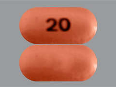 This is a brownish-pink oval Tablet Dr imprinted with 20 on the front, nothing on the back, and is manufactured by WAL-MART STORES.