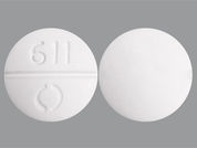 Methocarbamol: This is a Tablet imprinted with 611 and logo on the front, nothing on the back.