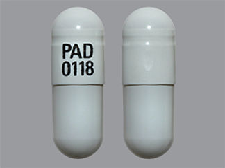 This is a Capsule Er 24 Hr imprinted with PAD  0118 on the front, nothing on the back.