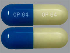 This is a yellow oblong Capsule imprinted with OP 64 on the front, OP 64 on the back, and is manufactured by CAMERON PHARMAC.